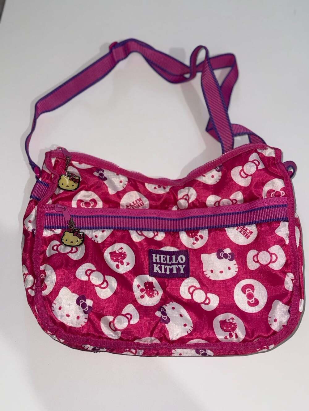 Hello Kitty Pink Nylon Crossbody Bag with Character Zipper Pulls